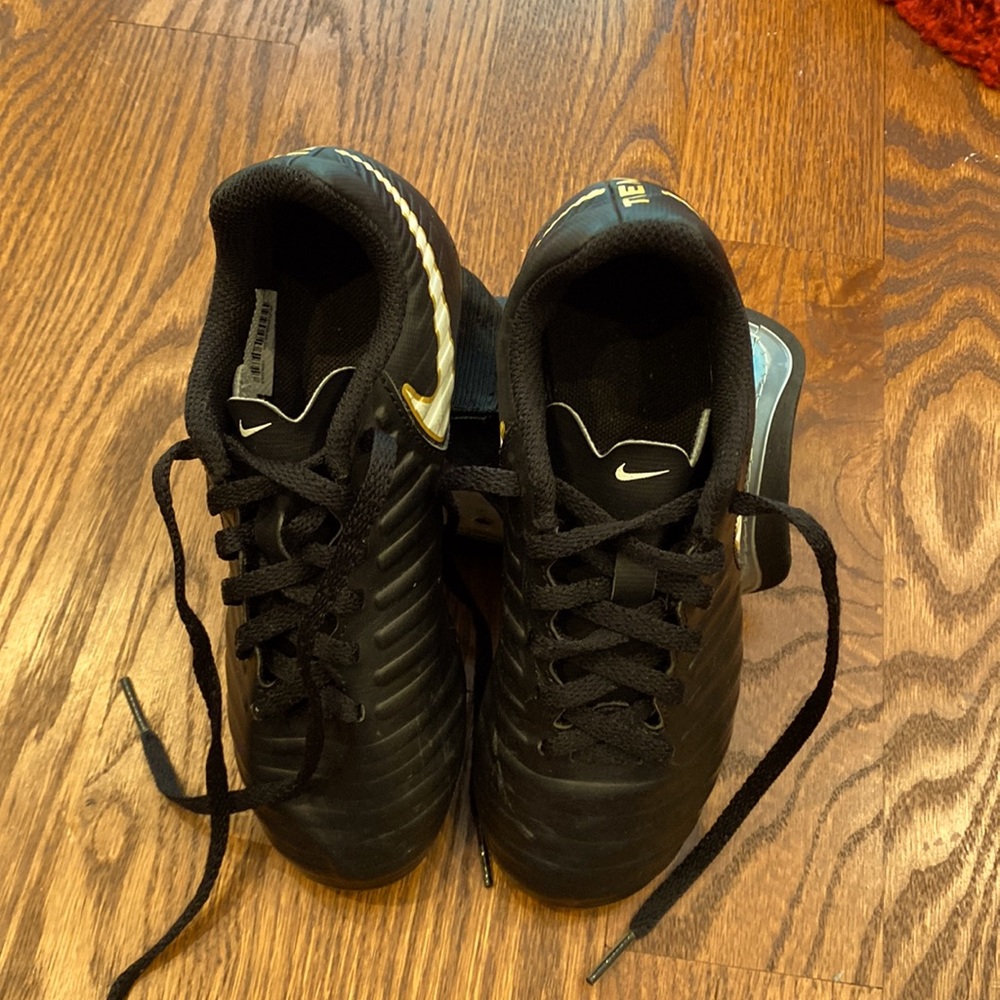 Black Nike Tiempo soccer shoes